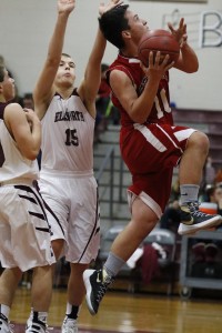 Andrew Speed (10- shown here in a game earlier this season) scored 13 points in a 50-47 Central win over Caribou.
