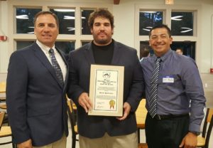 Josh celebrating his award with his Dad, Maynard and Coach Ayala