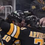 Minten scores in overtime as the Bruins win their home opener
