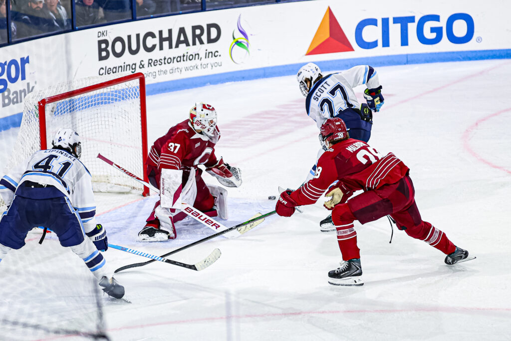Scott scores in overtime, as Maine men’s hockey rallies past Colgate to split on homecoming weekend
