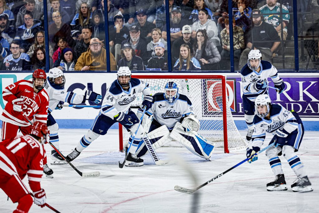 Holt scores in overtime, as Maine nets a gritty comeback win over Boston University in their Hockey East opener