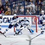 Holt scores in overtime, as Maine nets a gritty comeback win over Boston University in their Hockey East opener