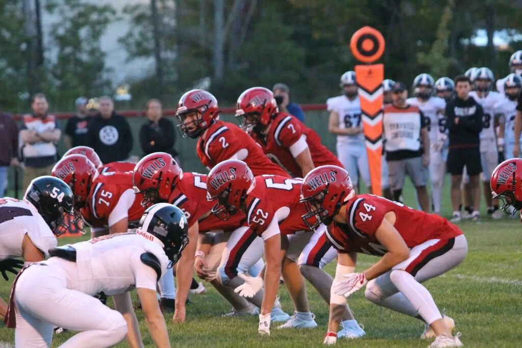 Wells rallies late to trip up Freeport in a crossover football matchup
